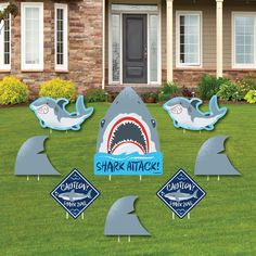 Shark Lawn Decorations INCLUDES 8 coordinating Shark Zone yard decorations: 1 Large Shark Attack, 2 Caution Sign, 2 Shark, 3 Fin, and 16 metal stakes for displaying. Easy assembly instructions are also included. PERFECT FOR ANY LOCATION! Shark Zone Yard Signs SIZE Large Shark Attack 15.25" x 19.75"; Caution Sign 11.25" x 1125"; Shark 14.25" x 7.75"; Fin 10.75" x 8.75". Shark yard decor is an easy way to decorate your home or business for baby shower or birthday party. Both adults and kids will l Jawsome Shark, Shark Sign, Shark Themed Birthday Party, Lawn Decorations, Birthday Yard Signs, Shark Birthday Party, Yard Ornaments, Lawn Ornaments, Shark Party