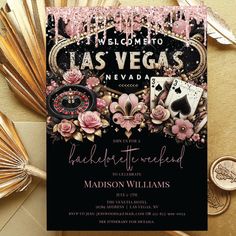 a las vegas themed birthday party with pink flowers and playing cards on the front, black background