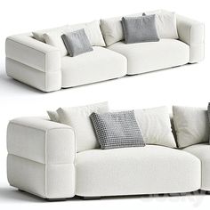 two white couches with pillows on them, one is empty and the other has no cushions