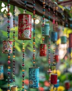 many colorful beads hanging from a wooden beam