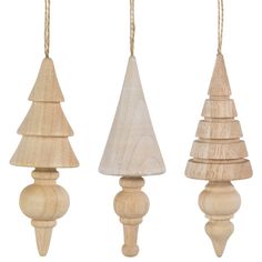 three wooden christmas trees hanging from strings