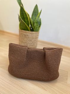 👜Discover elegance and sustainability in one beautiful accessory with our Elegant Chocolate Brown Raffia Rope Clutch Bag.  The rich, chocolate brown hue complements a myriad of colors, making it a versatile addition to your wardrobe. ✔️The rope design not only adds a unique texture but also gives the bag a modern, bohemian flair that stands out. It's not just a bag--it's a statement piece that elevates your style while keeping your essentials secure. 📌Technical Details: For Small Size: Width : Elegant Woven Top Handle Beach Bag, Elegant Straw Bag With Rolled Handles, Elegant Brown Bucket Bag With Rolled Handles, Elegant Straw Bag With Rolled Handles For Everyday Use, Elegant Rectangular Straw Bag With Rolled Handles, Elegant Top Handle Beach Bag For Travel, Chic Rectangular Beach Bag With Rolled Handles, Natural Rectangular Crochet Bag With Rolled Handles, Natural Color Rectangular Crochet Bag With Rolled Handles