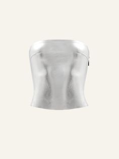 Introducing the Killa bandeau in Chrome: a statement piece that combines edgy style with ethical design. Crafted from high-quality vegan leather, this silver tube top offers a sleek and modern look that's both luxurious and animal-friendly. Whether dressed up for a night out or paired with casual attire for a daytime look, the Killa Bandeau adds a touch of bold sophistication to any outfit. Elevate your wardrobe with this versatile and sustainable piece, perfect for the eco-conscious fashionista Silver Tube Top, Metallic Tops, Edgy Style, Silver Tops, Party Outfits, Going Out Outfits, Casual Attire, Eco Conscious, Fashion Killa