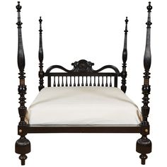 an antique style bed with four posts and white linens on the bottom, against a white background