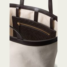 Bottega Veneta tote bag in leather and cotton  Flat shoulder straps  Exterior, front zip pouch can be reversed to be placed inside  Approx. 11.8"H x 11.6"W x 8.3"D Made in Italy Designer Canvas Shoulder Bag With Handles, Designer Canvas Bag With Double Handle For Errands, Designer Double Handle Canvas Bag For Errands, Designer Canvas Tote Bag For Errands, Designer Tote Canvas Bag For Errands, Designer Canvas Bag With Top Handle For Errands, Designer Canvas Tote Bag With Top Carry Handle, Designer Canvas Tote Bag With Top Handle, Designer Canvas Bag With Top Carry Handle For Errands