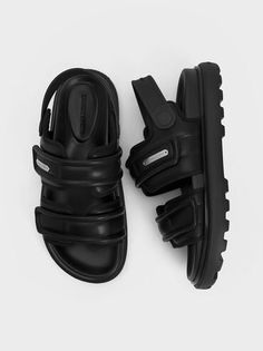 Black Romilly Puffy Sports Sandals | CHARLES & KEITH Comfortable Open Toe Sandals For Streetwear, Casual Open Toe Slides With Padded Heel, Modern Black Slides With Padded Heel, Black Slides With Padded Heel For Summer, Casual Sandals With Padded Heel, Casual Slingback Sandals With Padded Heel And Round Toe, Black Sport Sandals With Leather Footbed For Summer, Black Leather Footbed Sport Sandals For Summer, Comfortable Black Slingback Sandals With Round Toe