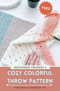 a crocheted scarf with text that reads beginner friendly cozy colorful throw pattern