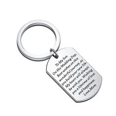 a metal key chain with a quote on it