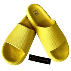 No Boundaries Pillow Soft Slide On Open Toe Cloud Sandals. Non-Slip. New With Tags. Size 10. Color Yellow. Lightweight & Waterproof. Thick Underfoot Cushioning With Anti-Slip Sole. Platform Sole. A Single Broad Strap Hugs The Foot For A Snug Fit. Helps Relieve Pressure And Tension. Easy To Clean. The Durable Wave-Shaped Non-Slip Eva Outsole Is Waterproof And Non-Slip, Providing A Good Grip For Your Feet Without Slipping. This Casual Style Is Suitable For All Seasons As Home Slippers, Bathroom Shower, Swimming Pool, Beach, Spa, Leisure, Public Shower, Steam Room, Dormitory, Camping, Hotel, Locker Room, Or Just Walking Around. Packaged With Care, Ship Same Day/Next Day Except Sun, Offers Welco Shower Steam Room, Public Shower, Cloud Sandals, Beach Spa, Home Slippers, Steam Room, Pool Beach, Locker Room, House Slippers