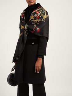 The Gucci Floral and Tassel-print Silk Shawl in Black is crafted from 100% silk in Italy. This oversized scarf doubles as a shaw and features a floral rope tassel print with geometric shapes, a deep, solid black base, GG logo at its center, and Gucci logo on the side. Black Floral and Tassel-print Silk Shawl Green, red, and gold accents 100% silk Oversized, square shaped scarf, shaw Rope tassel and flora print Geometric patterns Gucci logo at bottom GG logo at center 53" x 53" Product number 551066 Made in Italy Rope Tassel, Gucci Floral, Flora Print, Gucci Logo, Gucci Eyewear, Gg Logo, Oversized Scarf, Silk Shawl, Black Silk