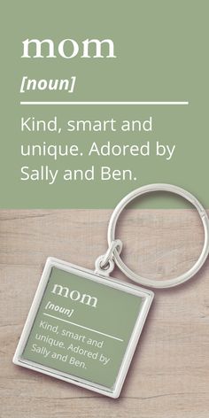 a keychain with the words mom on it and an image of a cat