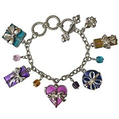 Charm Bracelets "Life's a Gift" - Bracelets For Women This very merry silvertone fashion accessory features a collection of festive presents that are tricked-out with beautiful bows, rhinestones, and colorful enamel. Additional strands of faceted beads are added into the mix, too, for a glamorous look. Adjust this bold toggle charm bracelet with the toggle clasp to a size that best suits you. Show your love for all things Christmas by wearing a little holiday cheer! Did someone say Christmas? Th Multicolor Jewelry Christmas Gift, Multicolor Christmas Jewelry Gift, Silver Bracelets For Party Or Gift, Silver Bracelets For Party, Great As Gifts, Silver Bracelets For Party As A Gift, Silver Bracelets For Party, Multicolor Christmas Gift Bracelets, Personalized Multicolor Charm Bracelet For Gift, Metal Beaded Bracelets With Charms As Gift