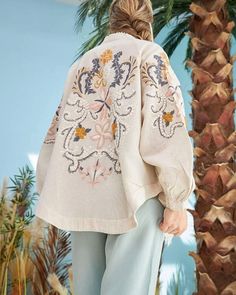 Indulge in timeless elegance with our Vintage Flower Embroidery Jacket. Crafted from linen and natural fabric, this jacket boasts a comfortable fit with its low shoulders and elasticated sleeves, ensuring both style and ease of movement. Whether you're strolling through bustling city streets or attending a quaint garden party, this jacket effortlessly elevates any ensemble. Pair it with your favorite jeans for a casual yet chic look, or layer it over a dress for an ensemble that seamlessly transitions from day to night. Standard Size. Fits to sizes; XS, S,M,L All clothes in our store are made of natural fabric. Dance Bodysuit, Summer Coat, Robe Women, Embroidery Jacket, Summer Coats, Festival Jacket, Embroidery Shirt, Women Jackets, Cloth Flowers