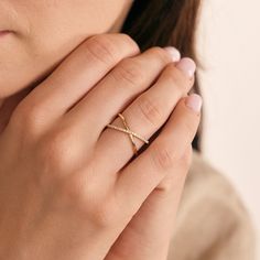 1- D E S C R I P T I O N Stylish and sophisticated, this Diamond Criss Cross Ring in 14K Solid Gold is a must-have for your jewelry collection. Perfect for stacking or wearing solo, this X-shaped ring offers a unique twist on traditional designs. Made with real gold, it's a dainty yet durable piece that makes an ideal gift for any occasion. Discover the allure of this crossover ring today. 2- P R O D U C T ∙  F E A T U R E S * Gold material: 14K solid gold * Gold color options: Yellow gold, Rose gold, White gold * Stone: Diamond Diamond Carat: 0.15 ct. Diamond Clarity: VS2 Diamond Color: F-G Diamond Cut: Excellent * Ring size options: - 5 US/CA - 5 1/4 US/CA - 5 1/2 US/CA - 5 3/4 US/CA - 6 US/CA - 6 1/4 US/CA - 6 1/2 US/CA - 6 3/4 US/CA - 7 US/CA - 7 1/4 US/CA - 7 1/2 US/CA - 7 3/4 US/CA - Criss Cross Ring Diamond, 14k White Gold Infinity Diamond Ring, Fine Jewelry 14k Gold Infinity Diamond Ring, Infinity Diamond Cut Fine Jewelry Ring, 14k Gold Infinity Diamond Ring Fine Jewelry, 14k Gold Diamond Infinity Ring, 14k Gold Infinity Diamond Ring, Stylish Gold Rings For Women, Gold Ring Designs Unique For Women