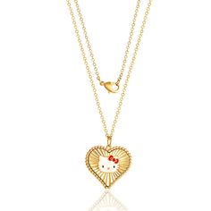 Embrace the adorable charm of Sanrio's beloved character with the Sanrio Hello Kitty Women's Starburst Heart Pendant Necklace. This exquisite necklace features a radiant starburst heart pendant, beautifully adorned with sparkling crystals, capturing the essence of Hello Kitty's playful and enchanting spirit. Crafted with attention to detail and yellow gold flash plated for durability and a lustrous shine, this necklace is designed to withstand the test of time. The 18-inch chain ensures a comfor Brass Necklace, Cat Necklace, Sparkling Crystal, Heart Pendant Necklace, Heart Pendant, Hello Kitty, Gold Necklace, Gold Plate, Plating