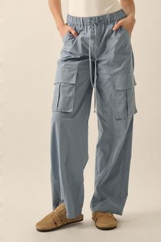 Solid twill pants. Drawstring elastic waist. Side pockets. Flap cargo pockets. Contrast stitching throughout. Ankle length. Wide leg. Relaxed fit. 100% Cotton. Imported. Designed in LA. Model wears size S. Drawstring Cargo Pants, Keep It Real, Twill Pants, Women Cargos, Vintage Canvas, Denim Pant, Contrast Stitch, Ankle Length, Cargo Pants