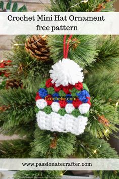 a crochet christmas ornament hanging from a tree with pine cones in the background