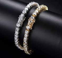 "Our best-selling diamond tennis chain bracelet is a classic and stylish design. This is a must-have for many that goes well in any occasion. Each round diamond created for optimum aesthetics. Our cubic Zirconia diamonds are measured at approximately 5mm each, all individually harbored and secured by hand for maximum quality, shine, and brilliance. Diamond Specifications Type: VVS Simulated Diamond | Cubic Zirconia Shape: Round Size: 5mm Necklace Specifications: 14k White Gold PVD Plated (Highes Mens Chain Bracelet, Cubic Zirconia Bracelet, Tennis Chain, Chain Bracelets, Diamond Chain, Hip Hop Jewelry, Tennis Bracelet Diamond, Timeless Jewelry, 여자 패션