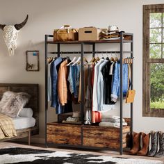 an open closet with clothes and shoes hanging on the rack, next to a bed