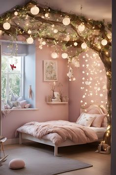 a bedroom decorated in pink and white with fairy lights hanging from the ceiling above the bed