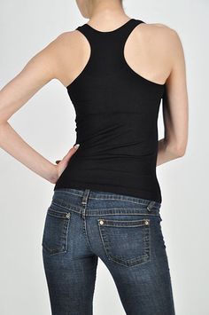 Ribbed racerback essential tank top. Perfect laying tank for just about any outfit you set out in! Available in black, chestnut, and charcoal. One size Material 92% Nylon 8% Spandex Racerback Top, Workout Attire, Jumpsuit Jacket, Pink Turquoise, Short Leggings, Skirt Leggings, Black Charcoal, Racerback Tank Top, Long Sleeve Sweatshirts