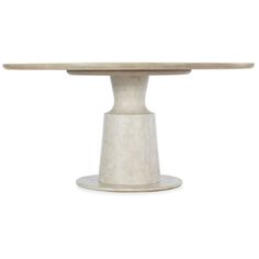 a white table with a pedestal on top