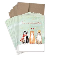 five cards with cats wearing sweaters and hats, one has a christmas card on it