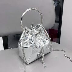 Too Glam to be Tamed! Hand-handled Tie-top Bag - cinch closure, Crossbody chain included. Height: 6' wide and 5' tall - ready to party! Silver Purse, Designer Shoulder Bag, Buckle Bags, Drawstring Bucket Bag, Rose Rouge, Designer Shoulder Bags, Evening Clutch Bag, Shoulder Messenger Bag, Evening Clutch