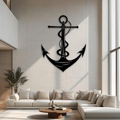 an anchor is mounted on the wall next to a white couch in a living room