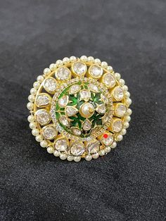 Indian Wedding Ring | Moissanite Ring| Indian Traditional Ring| Polki Ring|Moissanite Polki Ring | Indian Polki | Statement Ring | Ring | Material : Silver Gemstone: Moissanite, Swarovski Stones and Green Enamel Stone colour: Uncut Polki Primary colour: Gold Ring Size : Adjustable Silver Intricate, hand crafted, Pure Silver Polki Rings , studded with high quality Moissanite Polki , made in 92.5 silver with 22ct gold plating. Product comes with 92.5 silver hallmark. - We also Customize ring size Luxury Diamond Enamel Ring For Wedding, Luxury Diamond Enamel Wedding Ring, White Luxury Enamel Wedding Ring, Round Diamond Jewelry With Meenakari, Hand Set Green Rings For Wedding, Hand-set Green Rings For Wedding, Green Hand-set Wedding Rings, Green Emerald Wedding Ring With Single Cut Diamonds, Emerald Wedding Ring With Single Cut Diamonds