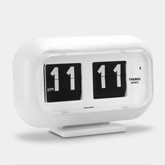 an alarm clock with two different time zones