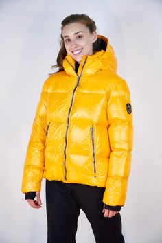 Jocelyn Ultra Puffy Ski Parka The Jocelyn Jacket, water-resistant and filled with down, combines fashion with function, ensuring you stay cozy and stylish on the slopes. With a high collar, helmet-friendly hood, and adjustable interior drawcord at the waist, this ultra puff puffer ski jacket offers a personalized fit. Indulge in the perfect combination of timeless sophistication and ski jacket finesse with the limited edition Jocelyn Ultra Puffy Jacket. Customize to make it truly one of a kind b Down Puffer Jacket With Double-lined Hood For Winter Sports, Sporty Down Puffer Jacket With Adjustable Hood, Windproof Down Puffer Jacket For Winter Sports, Winter Sports Down Puffer Jacket With Detachable Hood, Winter Sports Puffer Jacket With Detachable Hood, Hooded Down Puffer Jacket For Skiing, Hooded Down Outerwear For Skiing, Functional Hooded Puffer Jacket For Skiing, Hooded Nylon Puffer Jacket For Skiing