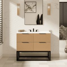 a bathroom with a sink, mirror and towel rack in it's center area