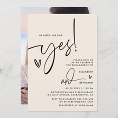 a wedding card with the words yes and an image of two people hugging each other