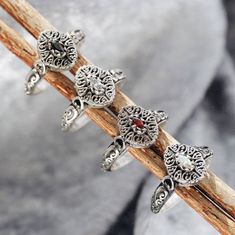 A unique Shop Dixi sterling silver gothic stacking ring. Featuring an enchanting mystic cubic zirconia centre in filigree detailing, she's a true unique ring for your boho jewelry collection MaterialSterling SilverCubic Zirconia SizingRing Sizes Available - 15.75mm [USA 5]. 18.25mm [USA SIZE 8]Ring Front - Height 10mm Witchy Ring, Rose Gold Band Ring, Precious Stones Rings, Buckle Ring, Witchy Jewelry, Gothic Rings, Jewelry Website, Cameo Ring, Rose Gold Band