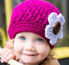 Hot pink crochet winter hat for baby girl comes with three interchangeable flower accessories. This chunky crochet hat keeps you warm and cozy in the winter months. Cozy hat for girls is accented with a wooden button for a natural look. Crocheted with premium chunky acrylic yarn in a beautiful stitch to provide luxurious texture. Cute hat for kids and adults! Makes an awesome gift or stocking stuffer. Handmade with care by Crocheting for Two. Sizes: 0-6 months, 6-12 months, 12-24 months, Toddler Baby Crochet Hat Pattern, Easy Crochet Beanie Pattern, Easy Crochet Beanie, Baby Crochet Hat, Chunky Crochet Hat, Easy Crochet Hat Patterns, Bonnet Au Crochet, Stocking Stuffers For Teens, Easy Crochet Hat