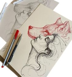 two drawings of a woman's face and a dog's head are shown