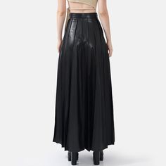 Step into effortless elegance with the Solace Vegan Leather Pleated Maxi Skirt in black. With a hidden zip closure and stylish golden embellishments, this skirt combines sophistication with a touch of luxury. The lightweight fabric drapes beautifully, offering a relaxed yet structured fit with just the right amount of stretch for comfort and durability. The vertical hand-pleating creates a flattering silhouette by elongating the lower body. Perfect for stylish occasions where comfort is key, thi Hand Pleating, Pleated Maxi Skirt, Pleated Maxi, Effortless Elegance, Draped Fabric, Lower Body, Independent Designers Fashion, Skirt Black, Badger