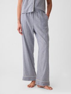 Soft linen-blend pajama pants.  Elasticized waist with drawcords.  Certain styles have allover prints.  * Fit: Relaxed.  An easy silhouette throughout.  Models wearing Gap Gap Wide Leg Linen Pants, Gap Linen Spring Pants, Gap Linen Pants For Spring, Spring Gap Linen Pants, Casual Linen Pants By Gap, Gap Cotton Bottoms For Daywear, Gap Casual Lounging Bottoms, Gap Bottoms For Daywear In Summer, Gap Bottoms For Summer Daywear