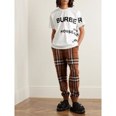 Burberry pays tribute to its heritage through patterns and prints, this cotton-jersey T-shirt falls on the more literal end of the spectrum. It features the brand name, founding year and Horseferry Road, a reference to its London HQ. Casual Cotton T-shirt With Signature Print, Cotton T-shirt With Signature Print In Relaxed Fit, Cotton Relaxed Fit T-shirt With Signature Print, Cotton Monogram Print Graphic Tee, Casual Cotton Tops With Signature Print, Graphic Tee With Exclusive Print In Cotton, Cotton Tops With Signature Print In Relaxed Fit, Italian Luxury Brands, Italian Luxury