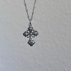 Gift your Catholic friend a stunning religious jewelry piece with this dainty silver cross necklace, perfect for women seeking minimalist elegance with a touch of charm from Silver Coquette Jewelry 𝐃𝐄𝐓𝐀𝐈𝐋𝐒:  ⭐️ Necklace lengths available 14" 16" 18" 20" ⭐️ Pendant size is 1" ⭐️ The silver cross charm is silver plated over alloy. The chain necklace is up on stainless steel, safe for those with sensitive skin ⭐️ Perfect for an everyday dainty cross necklace, The Royal Bliss cross necklace Silver Cross Clavicle Chain Necklace, Silver Cross Pendant Necklace With Clavicle Chain, Silver Pendant Cross Necklace With Clavicle Chain, Silver Minimalist Cross Necklace With Clavicle Chain, Silver Cross Necklace With Clavicle Chain, Minimalist Sterling Silver Cross Necklace With Clavicle Chain, Clavicle Chain Cross Necklace, White Gold Cross Necklace With Clavicle Chain, Sterling Silver Cross Pendant Charm Necklace