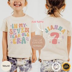 Unfortunately, we're unable to expedite the order. Kindly review the estimated delivery timeframe prior to finalizing your purchase. **Seventh Birthday Girl Shirt, 7th Birthday Girl shirt, Custom Seven Birthday Girl Shirt,In My Birthday Era Tee,B-day Gift For 7 Year Old Era ** ✨Our designs are original creations✨ ✨We welcome any custom orders you may have. Please message us! ✨ Celebrate your little one's big day with our "In My 7 Year Old Era" tee, perfect for a 7th birthday girl. This comfortab Cute Tops With Name Print For Birthday Gift, Cotton Tops With Name Print For Birthday Gift, 9 Year Birthday Shirt, End Of School Year Birthday T-shirt With Name Print, Girls 7th Birthday Shirt, Cotton Number Print T-shirt For Birthday, Six Year Old Birthday Shirt, Sassy 7 Birthday Shirt, Nine Year Old Birthday Shirt