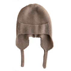 Inspired by the traditional Russian ushanka hat, this cozy cashmere earflap beanie will give your head maximal coverage this winter. The textured knit, earflap design, and neckties exude comfort and warmth. Cashmere is known for being a natural, soft, and high-end fabric. It is a popular material and continues to grow in demand due to its high quality and durability, while still being a natural product. Often, clothing materials can leave you feeling uncomfortable or itchy. However, that will ne Ushanka Hat, Russian Ushanka, Earflap Beanie, Brown Hats, Womens Cashmere, Clothing Material, Textured Knit, Independent Designers Fashion, Your Head