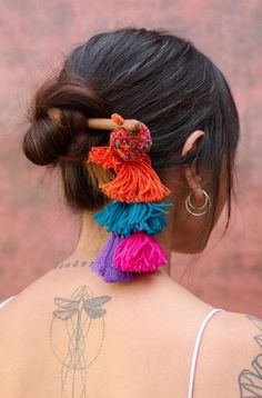 1. 100% artisanal 2. Handmade with love by Aftaab Get creative and dress your hair into cute buns with our handcrafted bun sticks. Color: Multicolour Material: Thread and wool tassels and pom poms Quantity: 1 Wash Care: Spot clean/ Dry clean This product has been crafted by hand and may have slight irregularities or imperfections in color or embellishment. These irregularities are the result of the human involvement in the process and add to the finished products charm while ensuring you have one-of-a-kind piece. Bun Stick, Wool Tassels, Cute Buns, Shirt Jacket Men, Silk Roses, Get Creative, Co Ord Set, Handmade With Love, Pom Poms