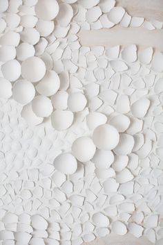 an abstract sculpture made out of white balls