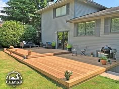 a large deck in front of a house