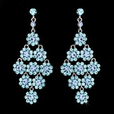 Aqua%20Floral%20Rhinestone%20Earrings%26nbsp%3B%0D%0AAdd%20a%20beautiful%20pop%20of%20color%20to%20your%20formal%20attire%20with%20these%20vibrant%20earrings.%20These%20silver%20plated%20bridal%20earrings%20feature%20a%20beautiful%20floral%20chandelier%20design%20accented%20with%20glistening%20aqua%20and%20light%20blue%20crystal%20rhinestones.%0D%0AA%20fabulous%20accessory%20choice%20for%20your%20wedding%2C%20prom%20and%20quinceanera!%0D%0ASize%3A%20The%20earrings%20fall%20to%20a%20stunning%203%22%20long.%0D%0AColor%3A%20Silver%2FAqua%2FLight%20Blue.%0D%0AStyle%3A%20e939aq.%0D%0ANeed%20several%20pair%20of%20earrings%20for%20your%20wedding%20party%20or%20damas%3F%20You%20can%20buy%20in%20bulk%20and%20save!%0D%0APlease%20allow%201%20week%20for%20delivery.%0D%0AShipping%20Policy.%0D%0AReturn% Aqua Jewelry, Formal Earrings, Jewelry Gift Guide, Black And White Earrings, Earrings Fall, Floral Chandelier, Crystal Chandelier Earrings, Wedding Day Gifts, Prom Earrings