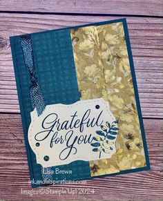 a handmade greeting card with the words grateful for you written in blue and gold