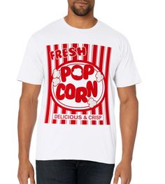 a man wearing a white t - shirt with the words fresh pop corn on it