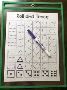 a roll and trace game with a pen on it